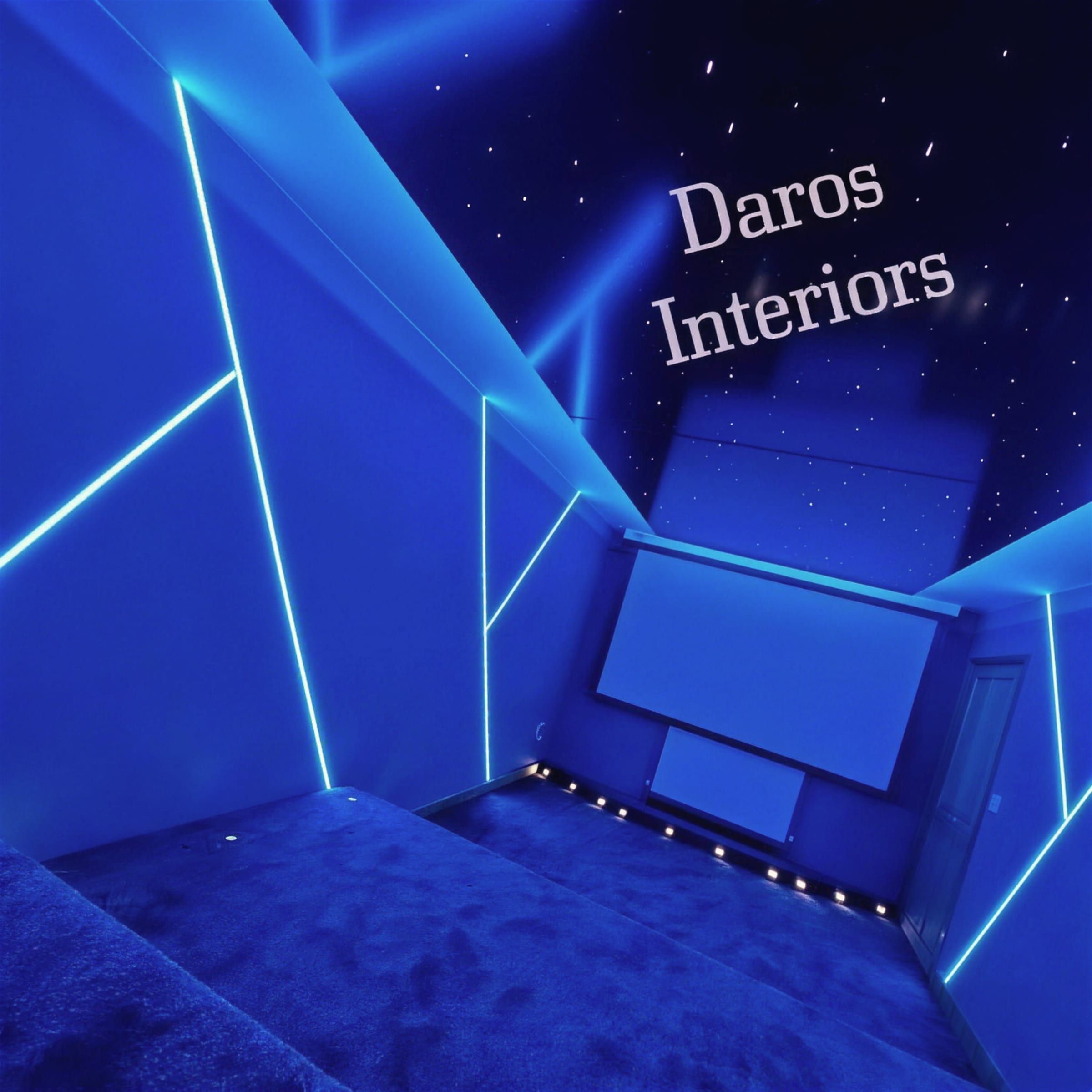 Cinema room corner with blue neon LED lines tracing wall panels above deep-blue velvet tiered seating, star ceiling above, watermarked Daros Interiors.